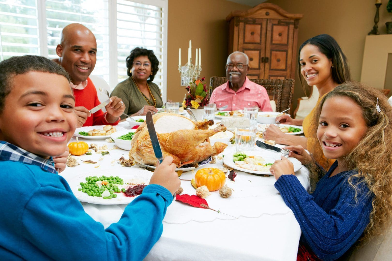 Multi Generation Family Celebrating Thanksgiving — Decide To Commit